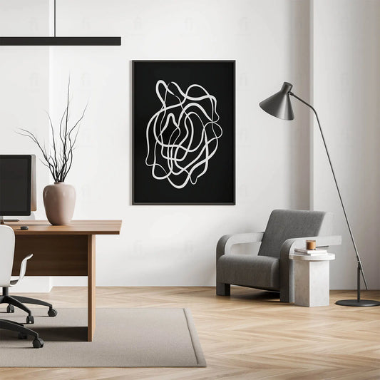 Plakat abstrakcyjny z liniami wiszący w nowoczesnym biurze.
